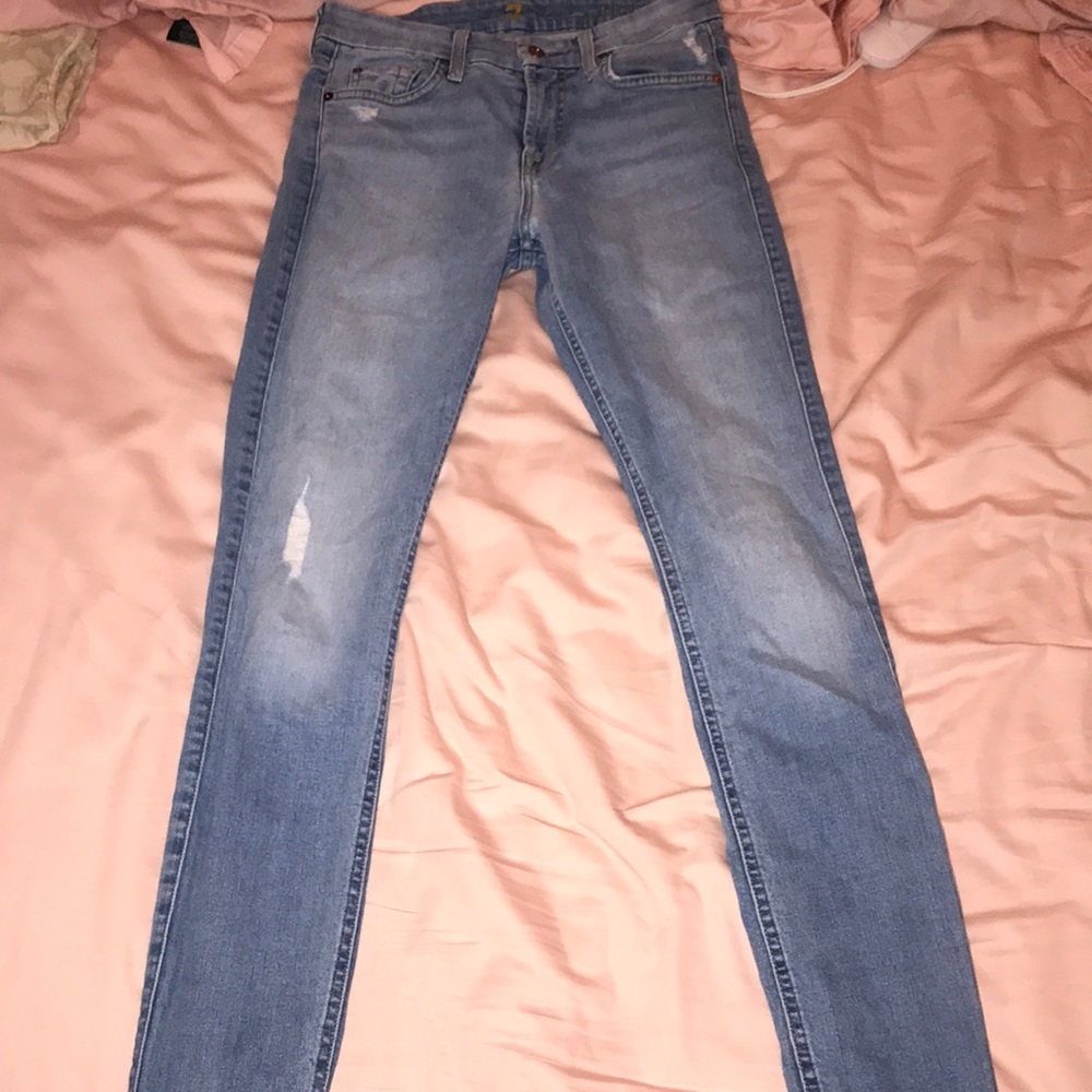 Light distressing blue washed skinny jeans